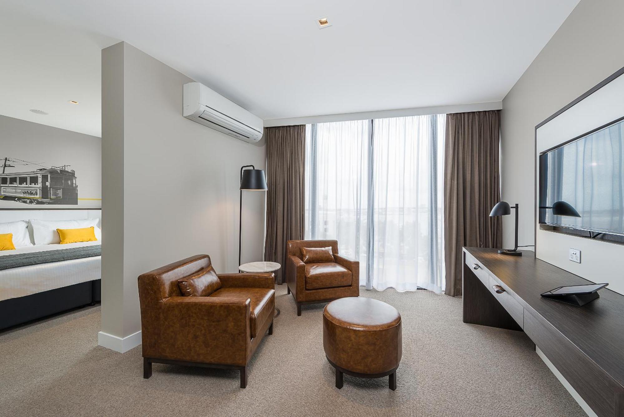 Hotel Peppers Docklands Melburne Exterior foto A suite at the hotel